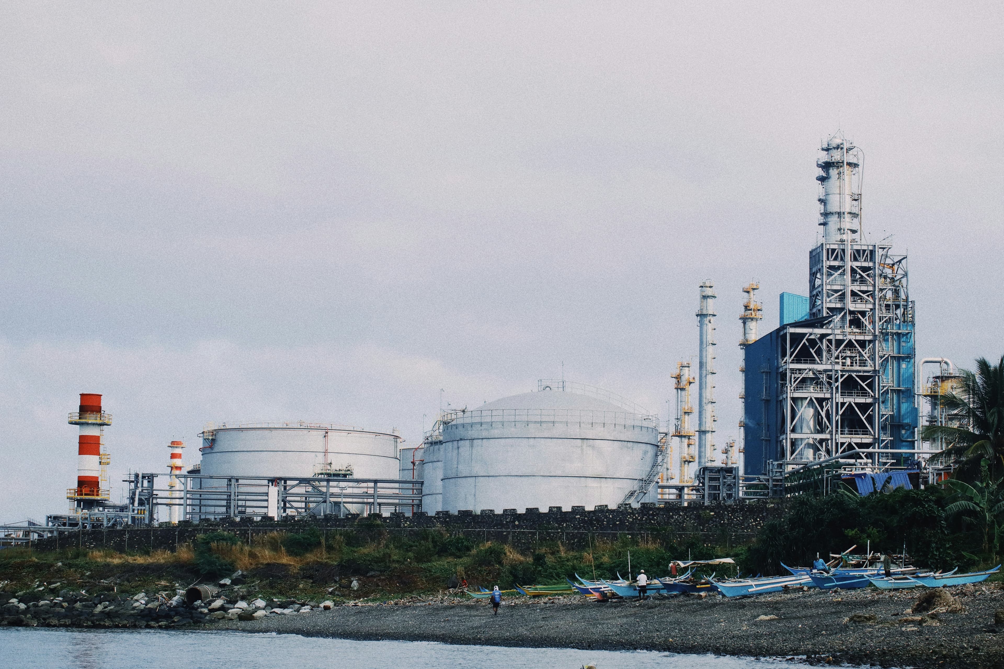 Oil refinery at dusk — industrial petroleum and energy infrastructure